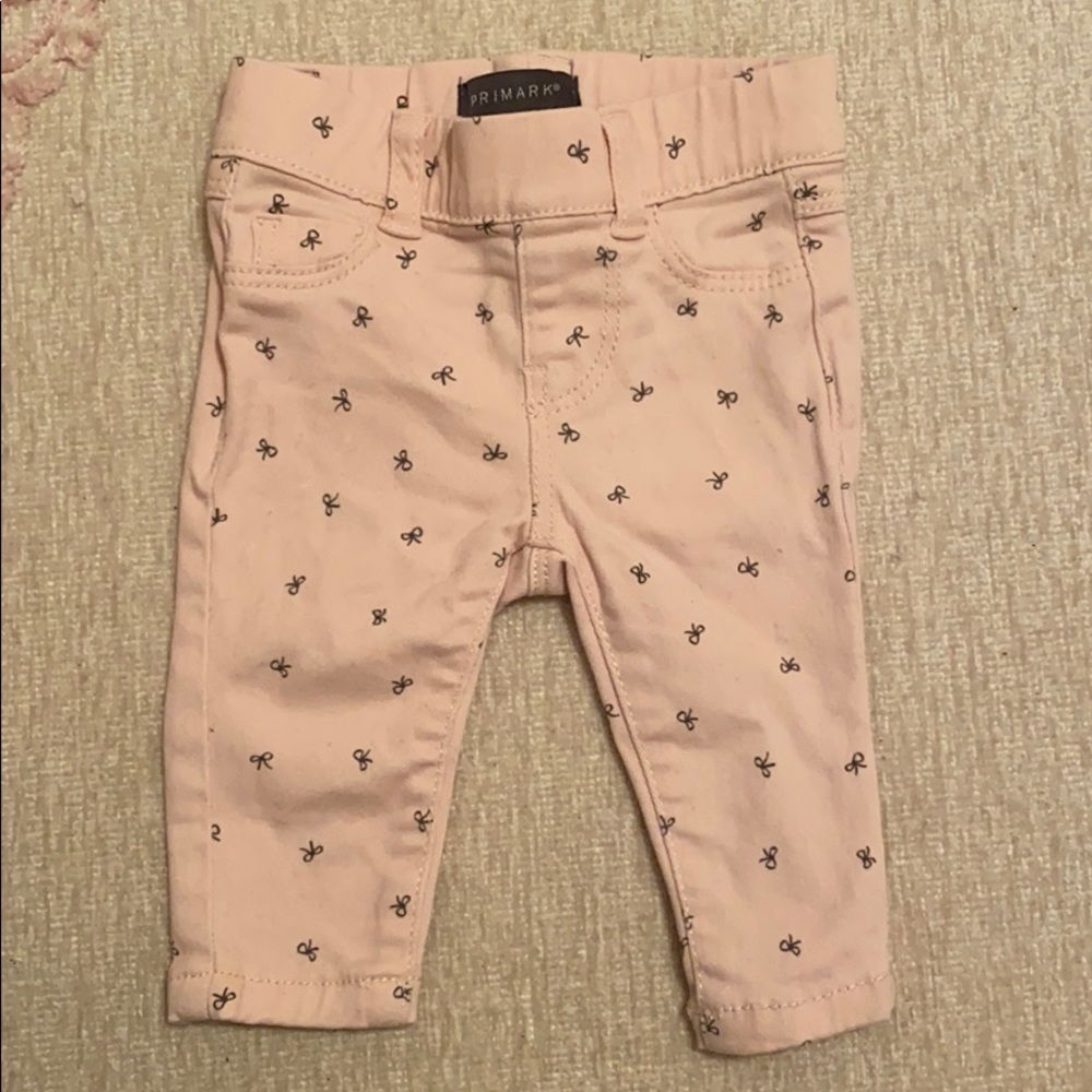 Pink bow jeans
